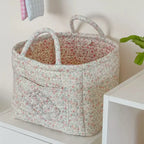 Sage blossom quilted floral storage basket with handles and front pocket
